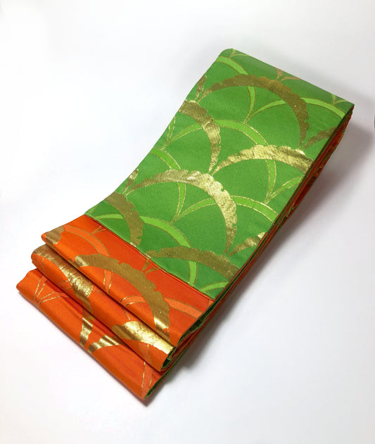 Reversible hanhaba obi - highlighter green and vivid orange with golden half-circles