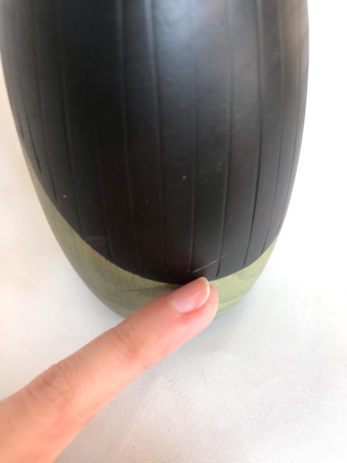 Cute wooden kokeshi doll with delicate flowers pattern by Usaburo