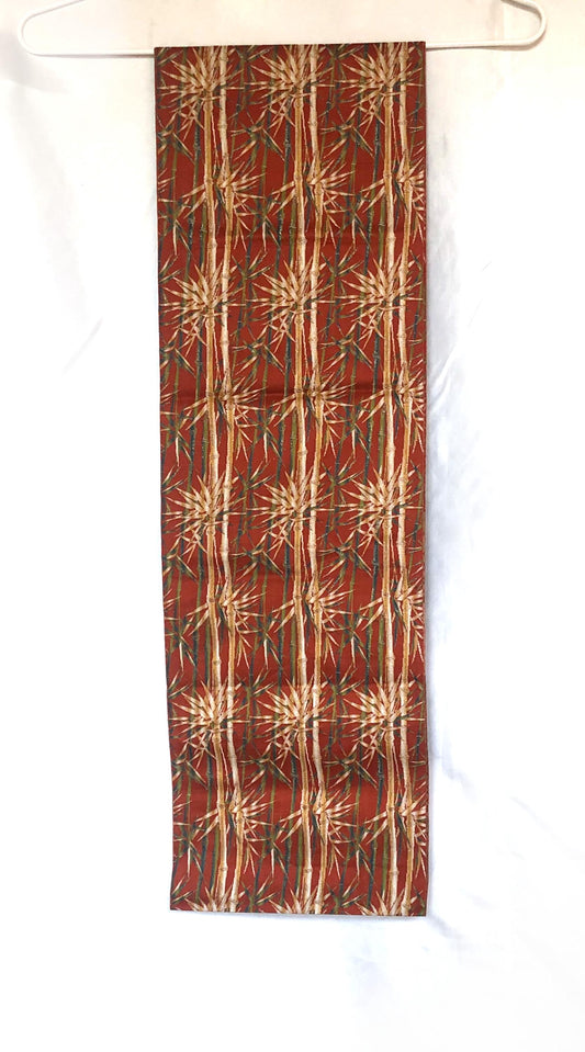 Vintage Nagoya obi - bamboo stalks on a red background