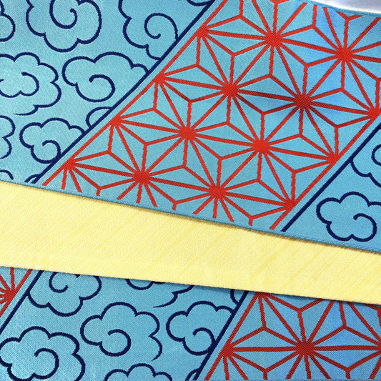 Reversible Japanese hanhaba obi - light blue and yellow with traditional red patterns (B grade)