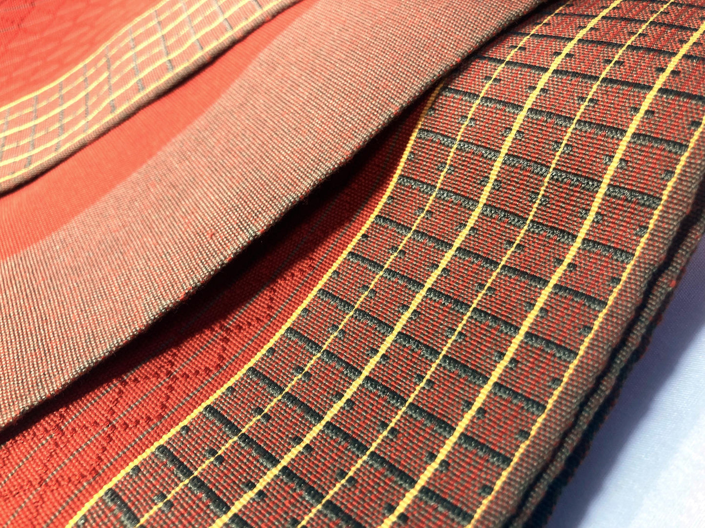 Elegant Japanese hanhaba obi - red and brown with a subtle geometric pattern