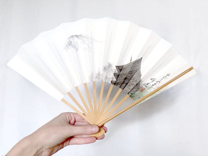 Decorative paper fan with a bamboo stand - different patterns available