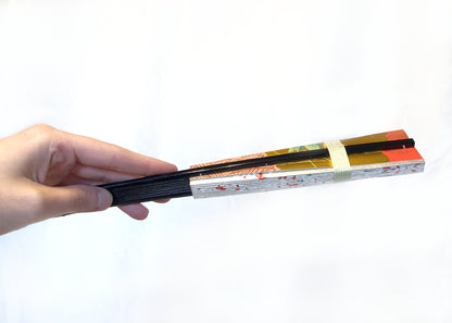 Decorative paper fan with a bamboo stand - different patterns available