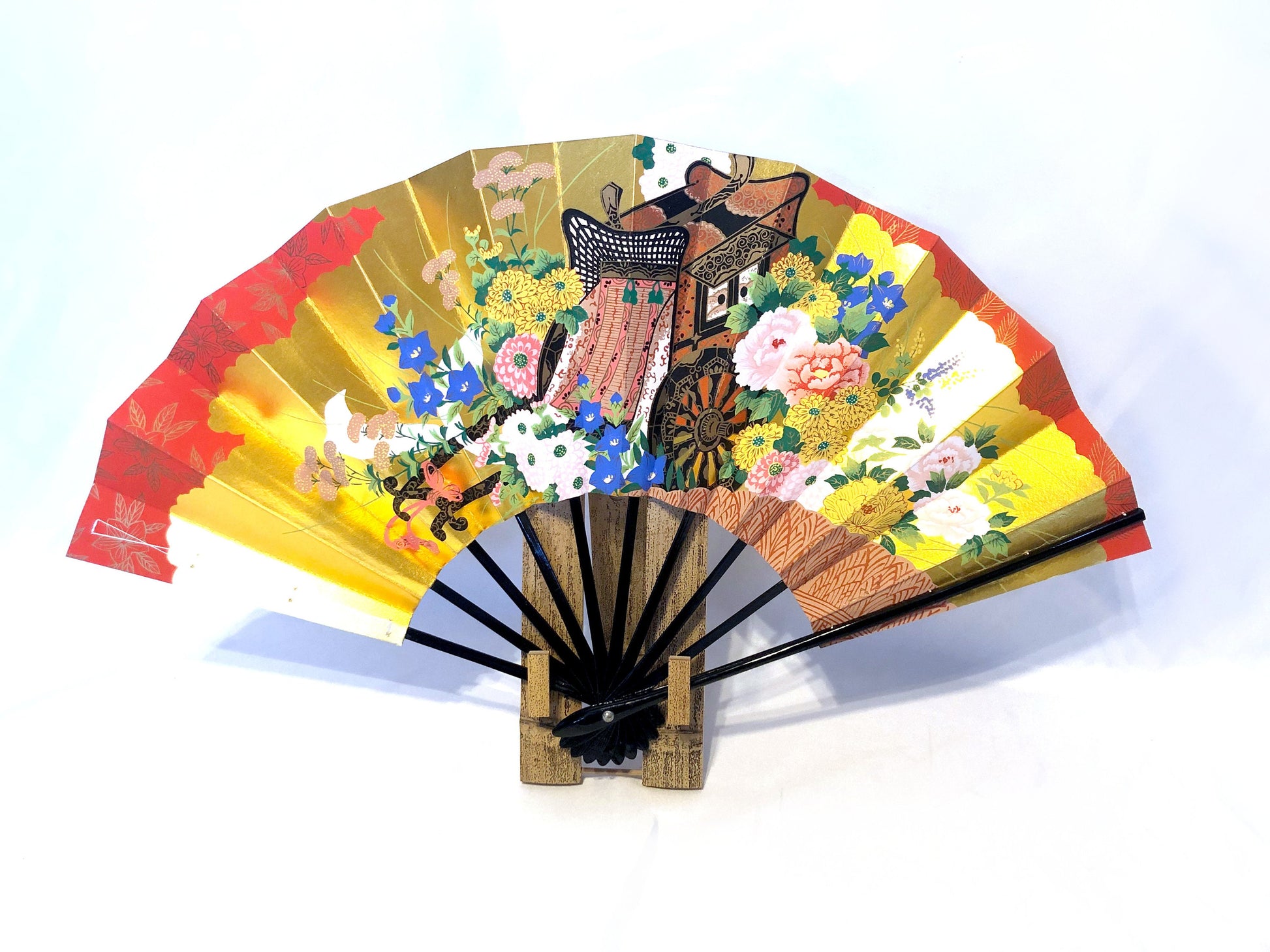 Decorative paper fan with a bamboo stand - different patterns available