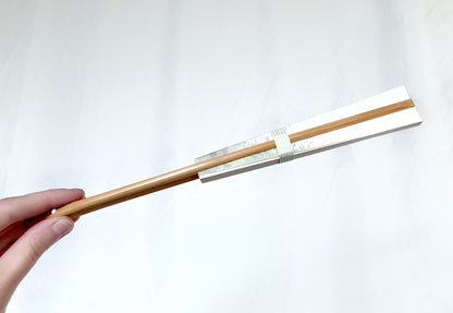 Decorative paper fan with a bamboo stand - different patterns available