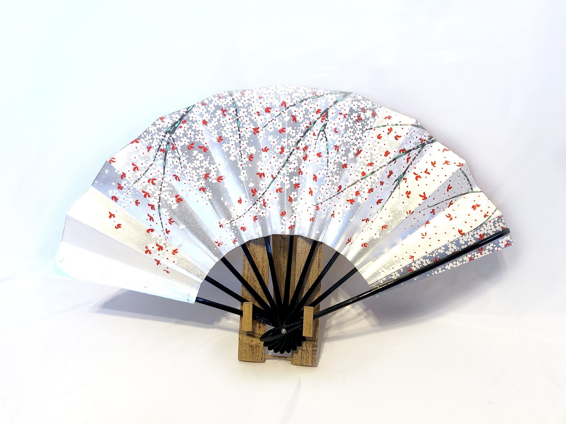 Decorative paper fan with a bamboo stand - different patterns available