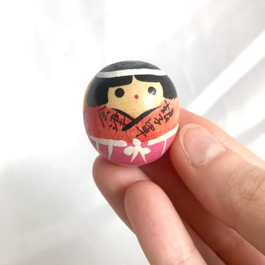 Miniature wooden kokeshi doll - naginata warrior