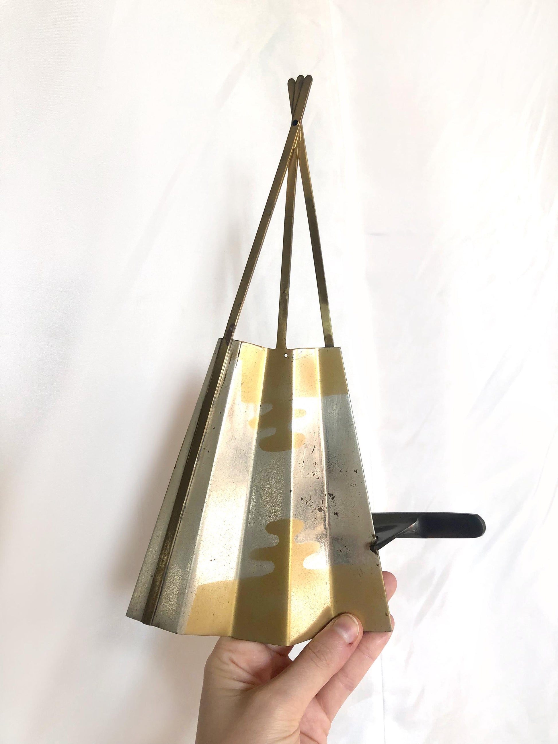 Japanese metal interior decoration - noh theater mask and a fan