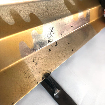 Japanese metal interior decoration - noh theater mask and a fan