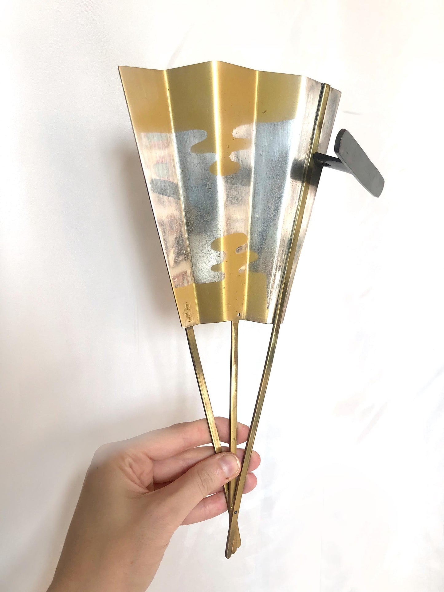 Japanese metal interior decoration - noh theater mask and a fan