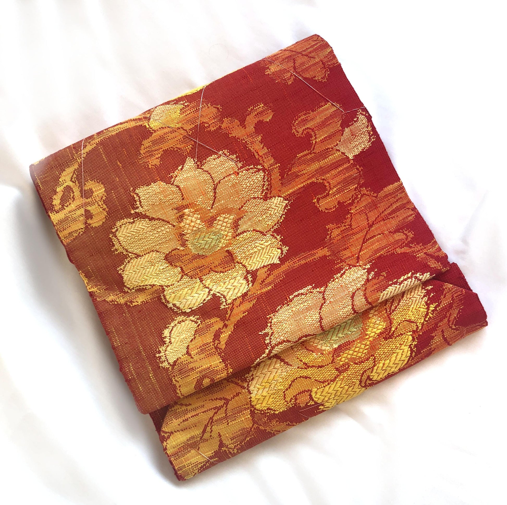 Vintage Nagoya obi - unused - textured orange with floral motifs