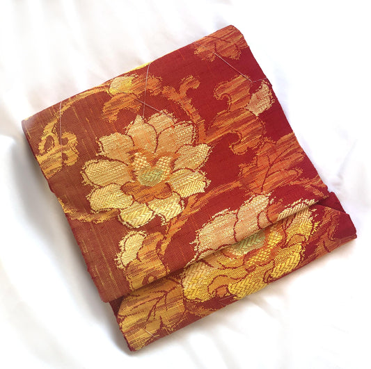 Vintage Nagoya obi - unused - textured orange with floral motifs