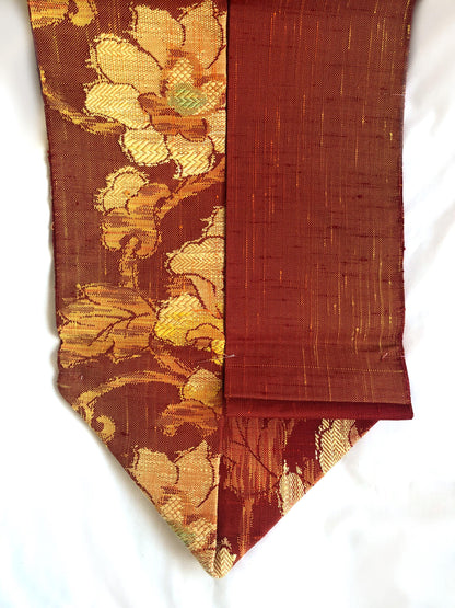 Vintage Nagoya obi - unused - textured orange with floral motifs