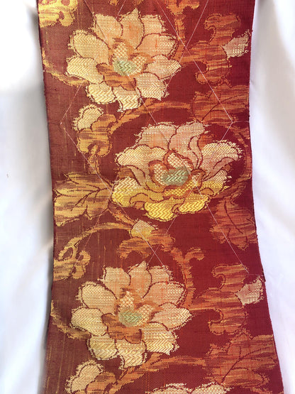Vintage Nagoya obi - unused - textured orange with floral motifs