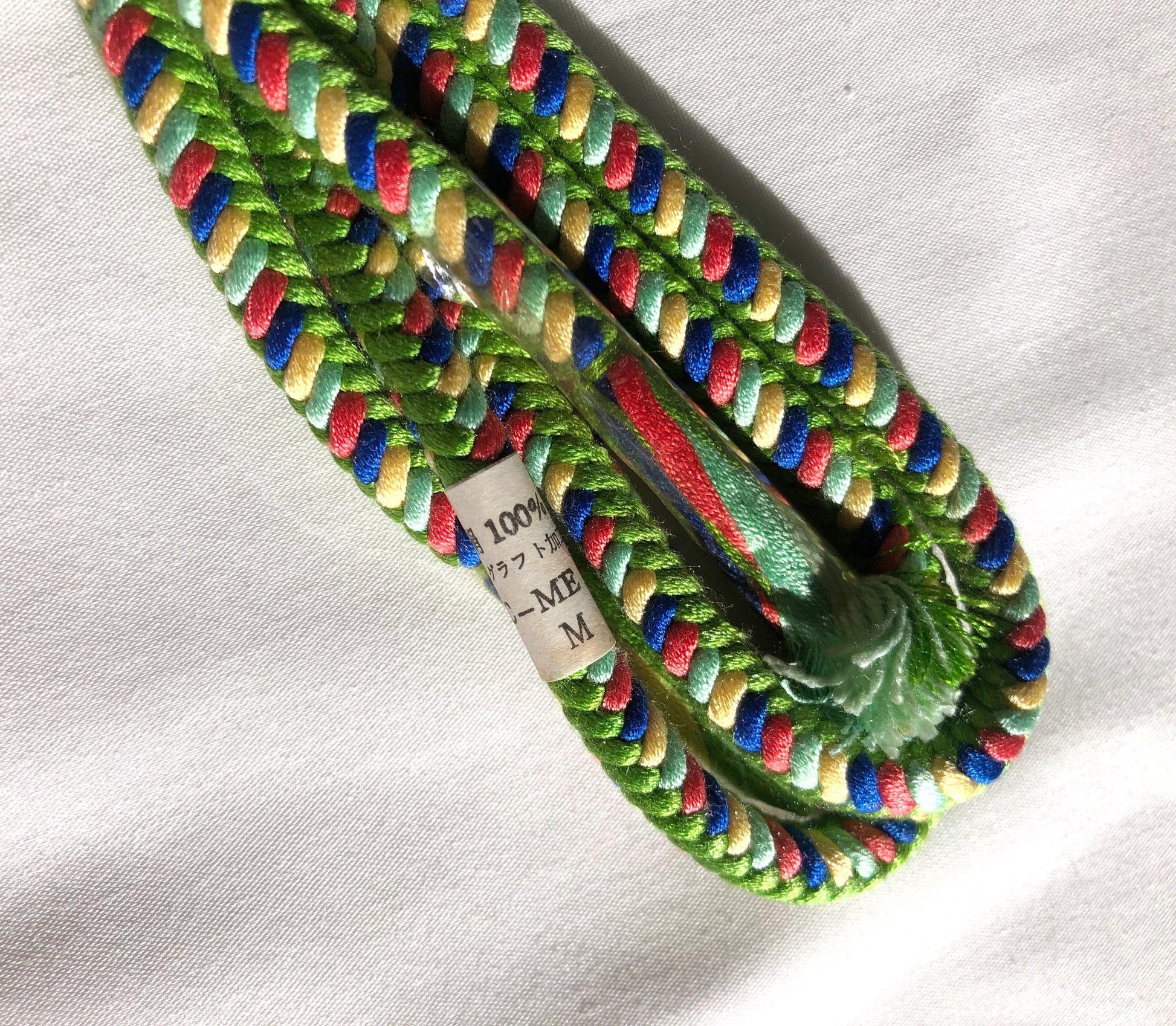 Vivid green silk obijime - thin belt with tassels