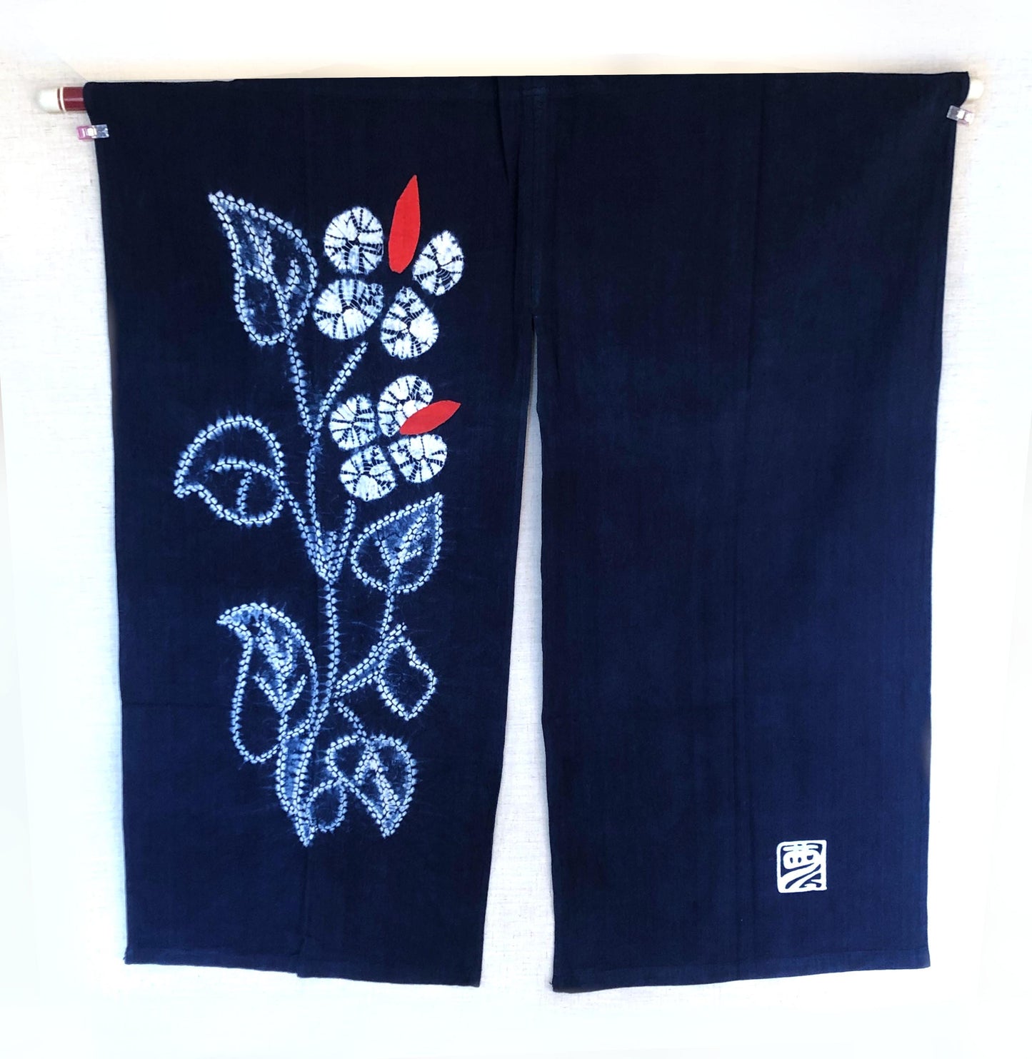 Indigo blue shibori noren with floral motif designed by Yumeji Takehisa