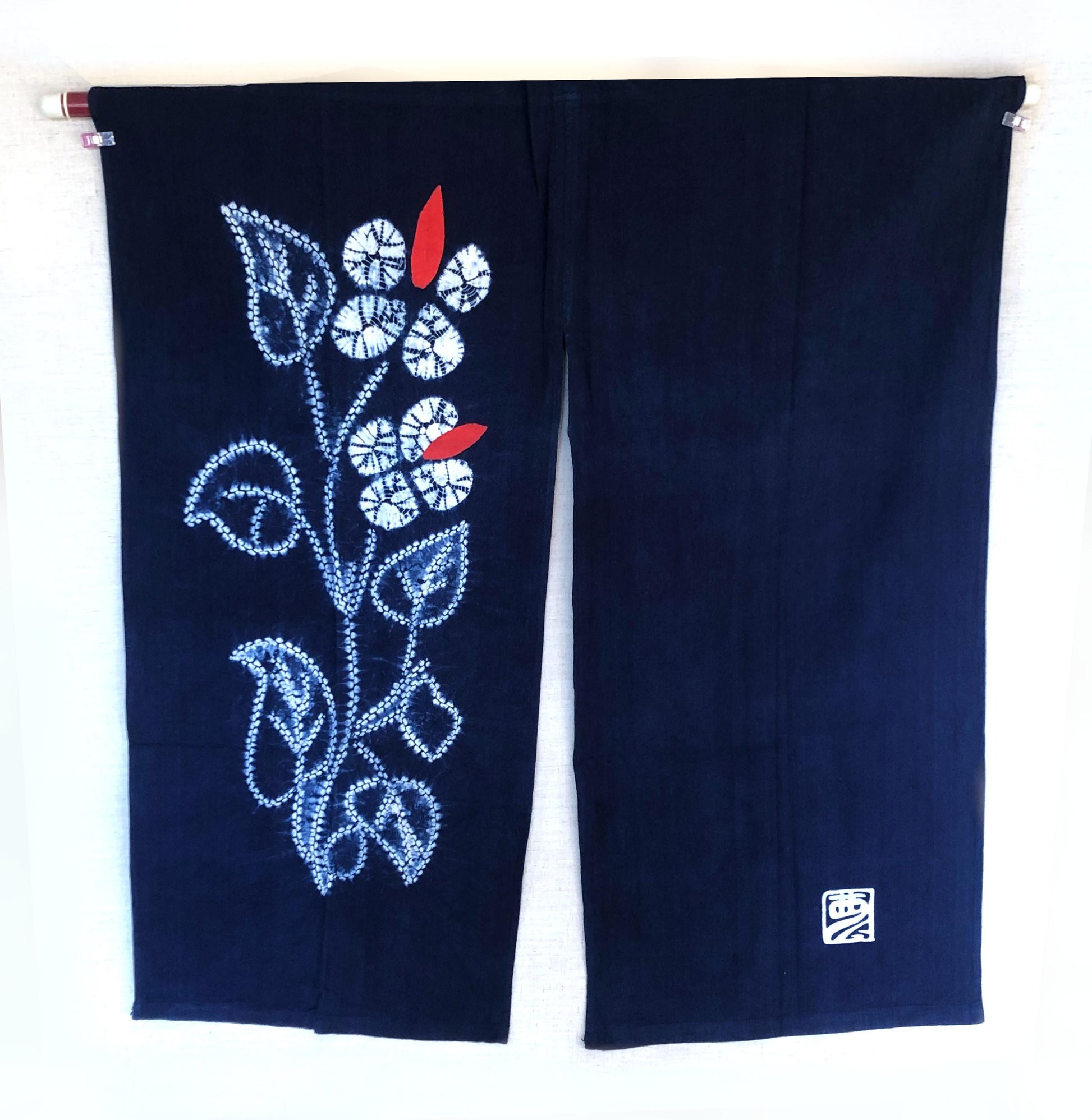 Indigo blue shibori noren with floral motif designed by Yumeji Takehisa