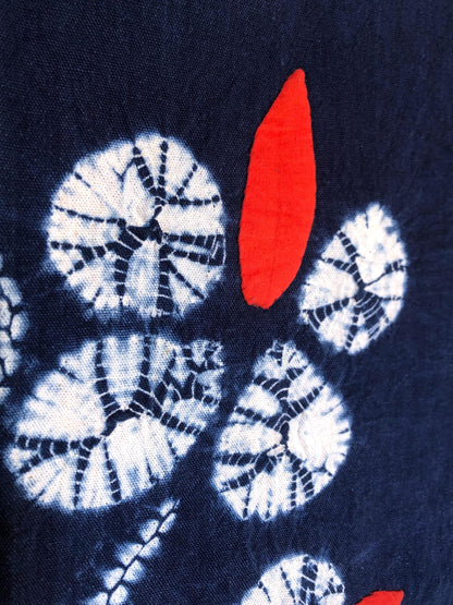 Indigo blue shibori noren with floral motif designed by Yumeji Takehisa