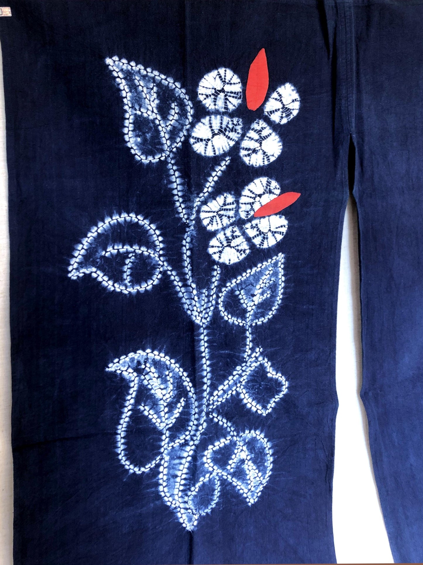 Indigo blue shibori noren with floral motif designed by Yumeji Takehisa