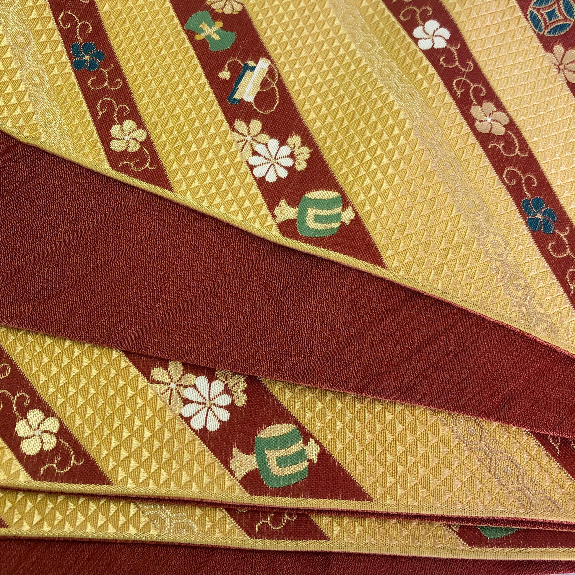 Reversible Japanese hanhaba obi - red and yellow with auspicious symbols