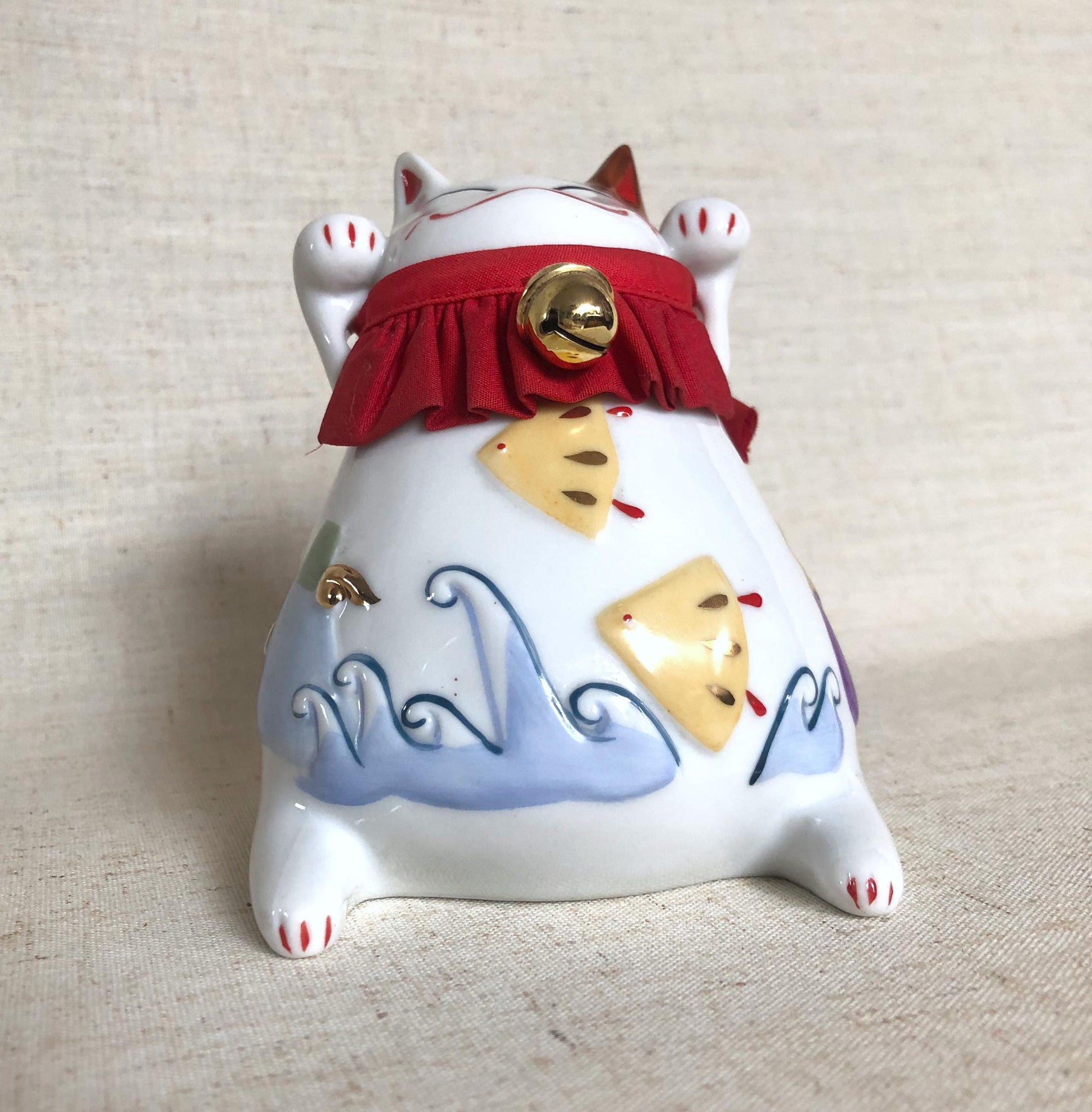Cute Japanese coin box - lucky cat with auspicious symbols