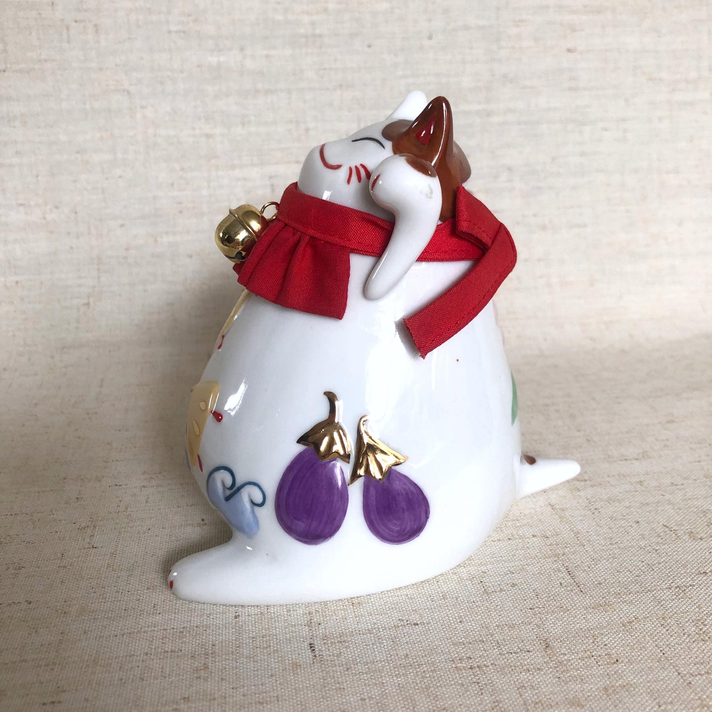 Cute Japanese coin box - lucky cat with auspicious symbols