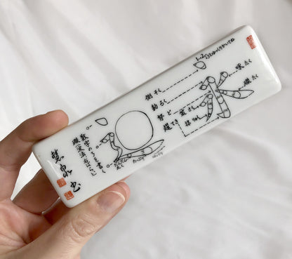 Japanese ceramic paperweight - calligraphy lesson