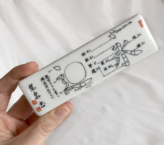 Japanese ceramic paperweight - calligraphy lesson