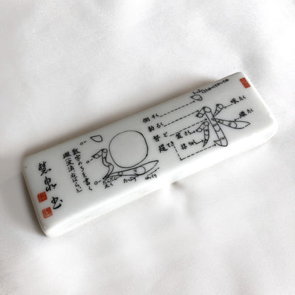 Japanese ceramic paperweight - calligraphy lesson