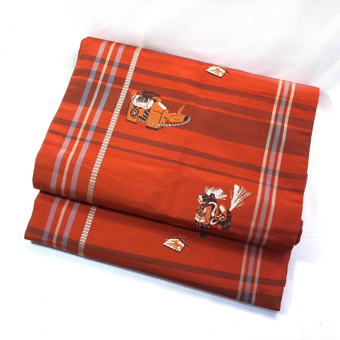 Casual Nagoya obi - terracota red with akabeko and miharu-koma pattern