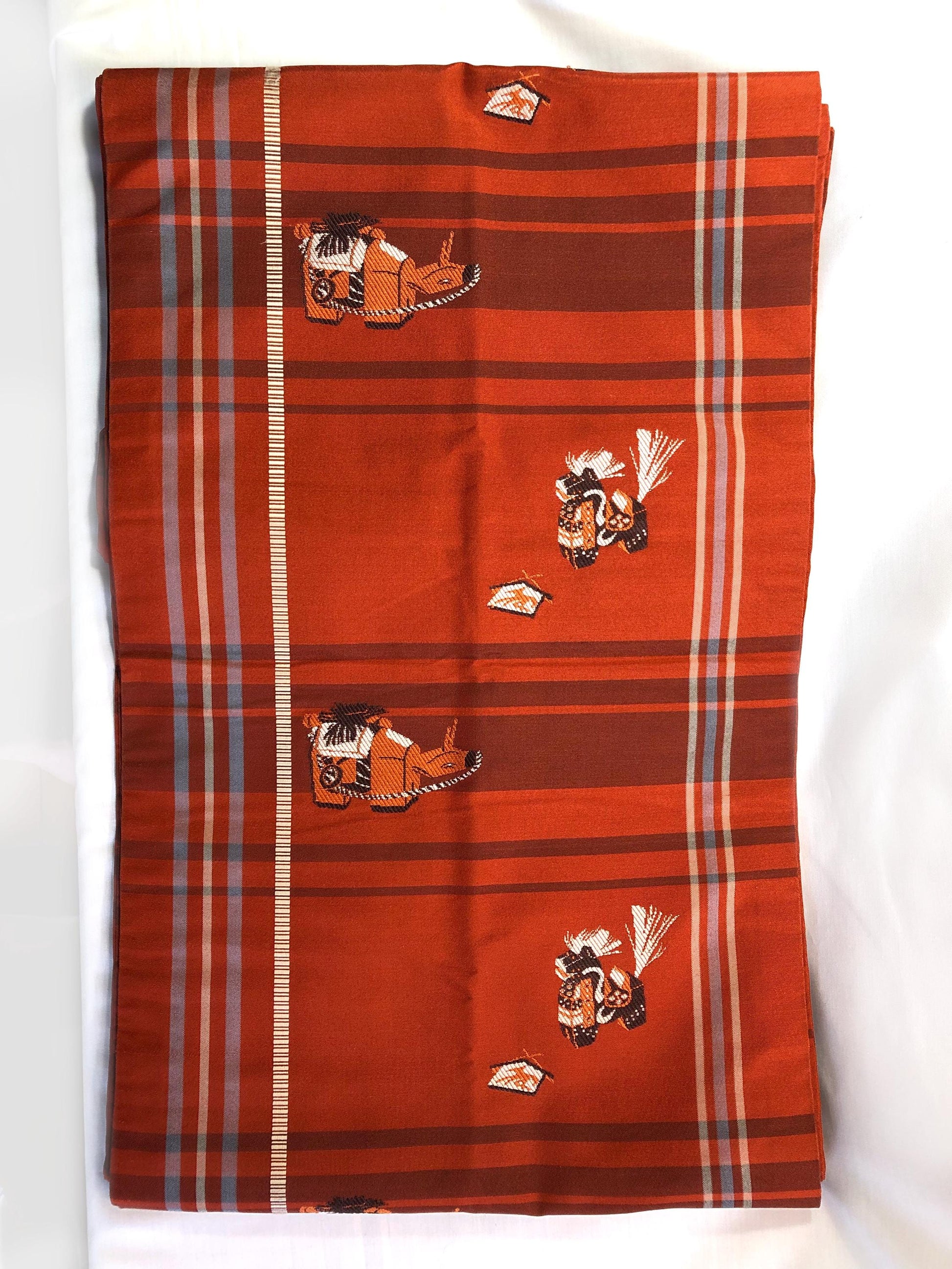 Casual Nagoya obi - terracota red with akabeko and miharu-koma pattern