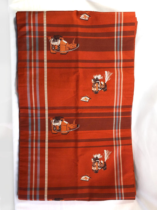 Casual Nagoya obi - terracota red with akabeko and miharu-koma pattern