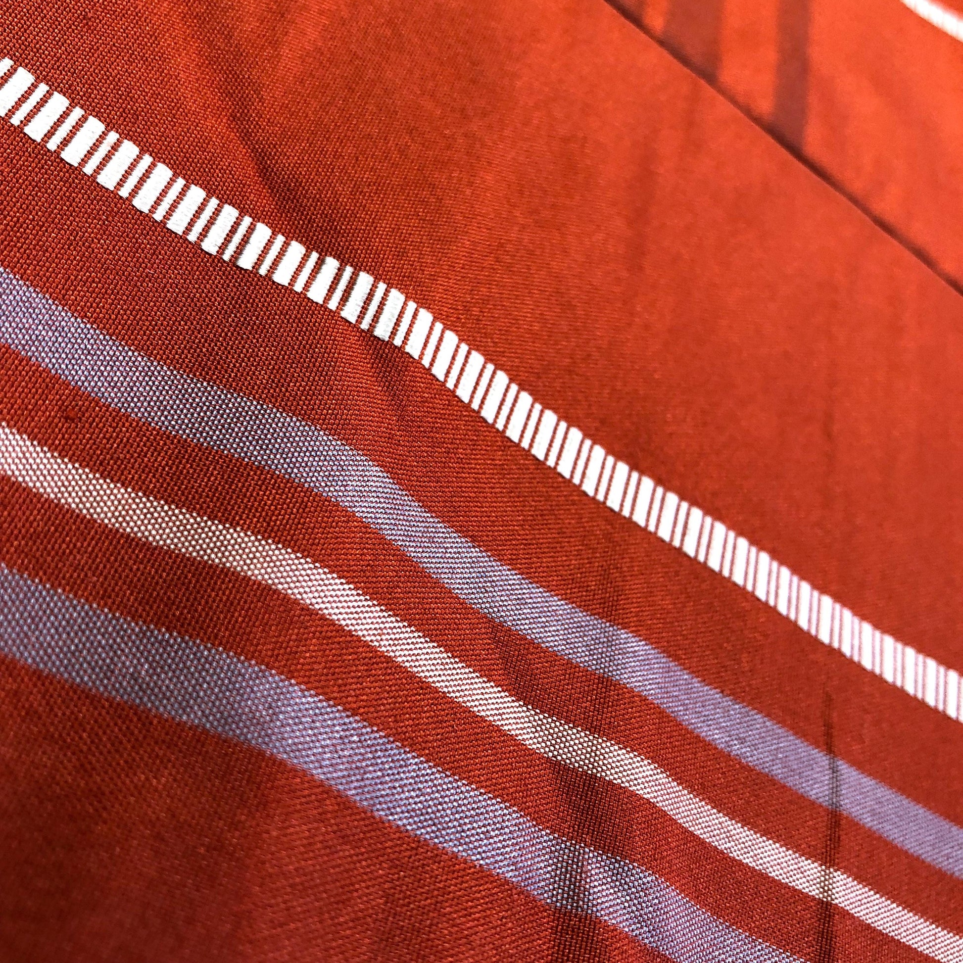 Casual Nagoya obi - terracota red with akabeko and miharu-koma pattern