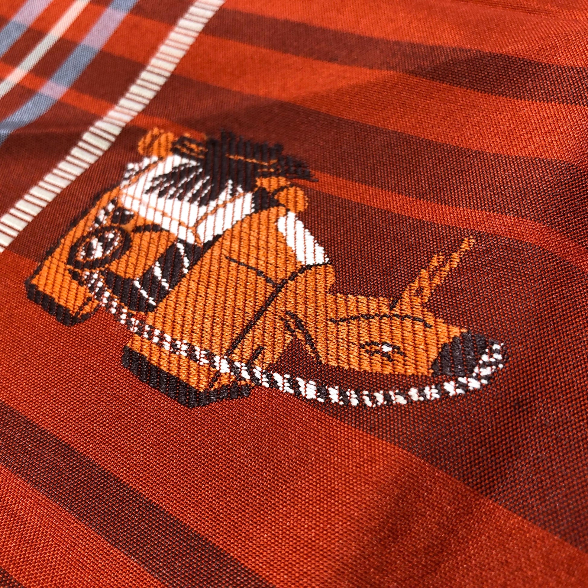 Casual Nagoya obi - terracota red with akabeko and miharu-koma pattern