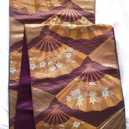 Fukuro obi - dark purple with bronze and gold hand fans pattern