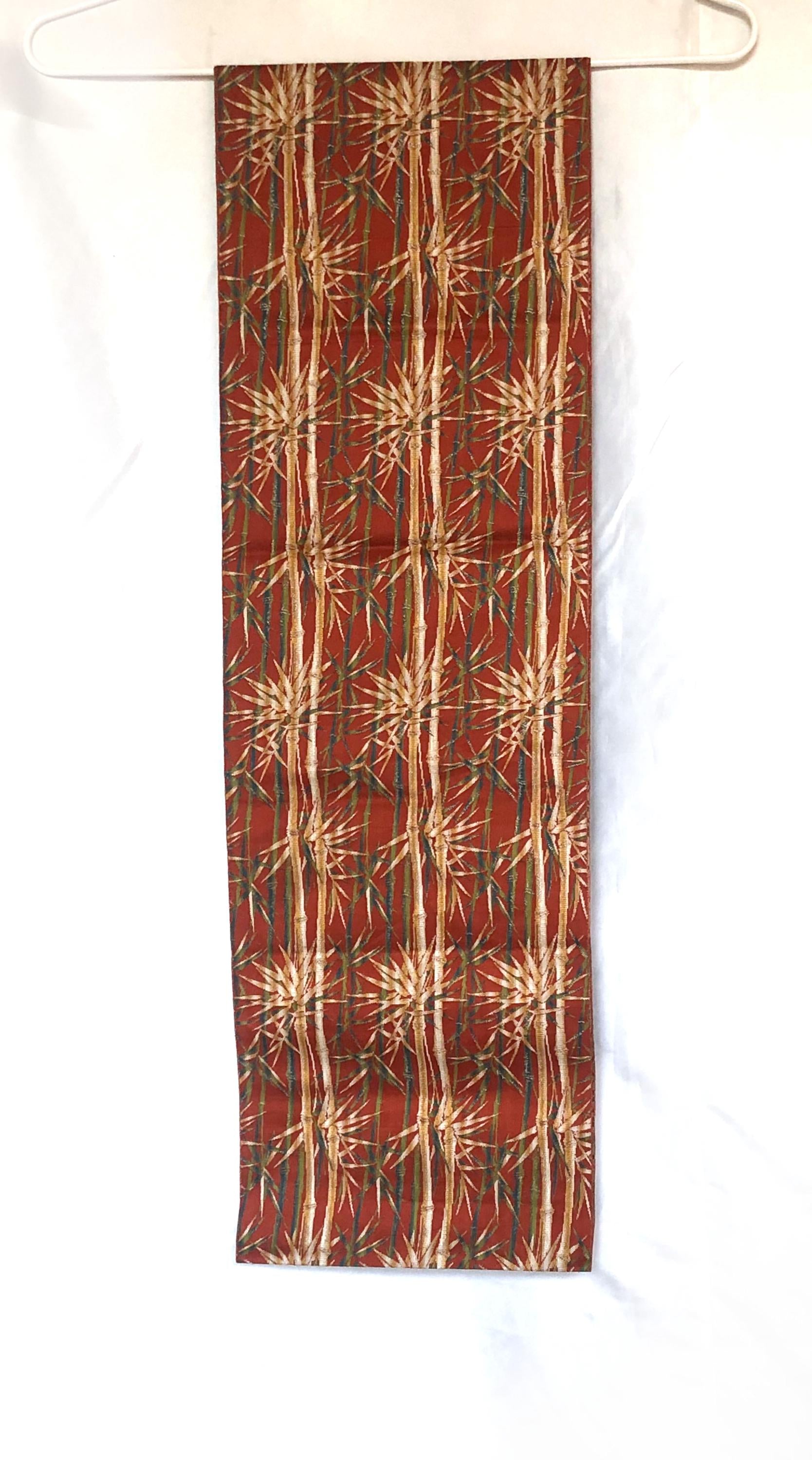 Vintage Nagoya obi - bamboo stalks on a red background