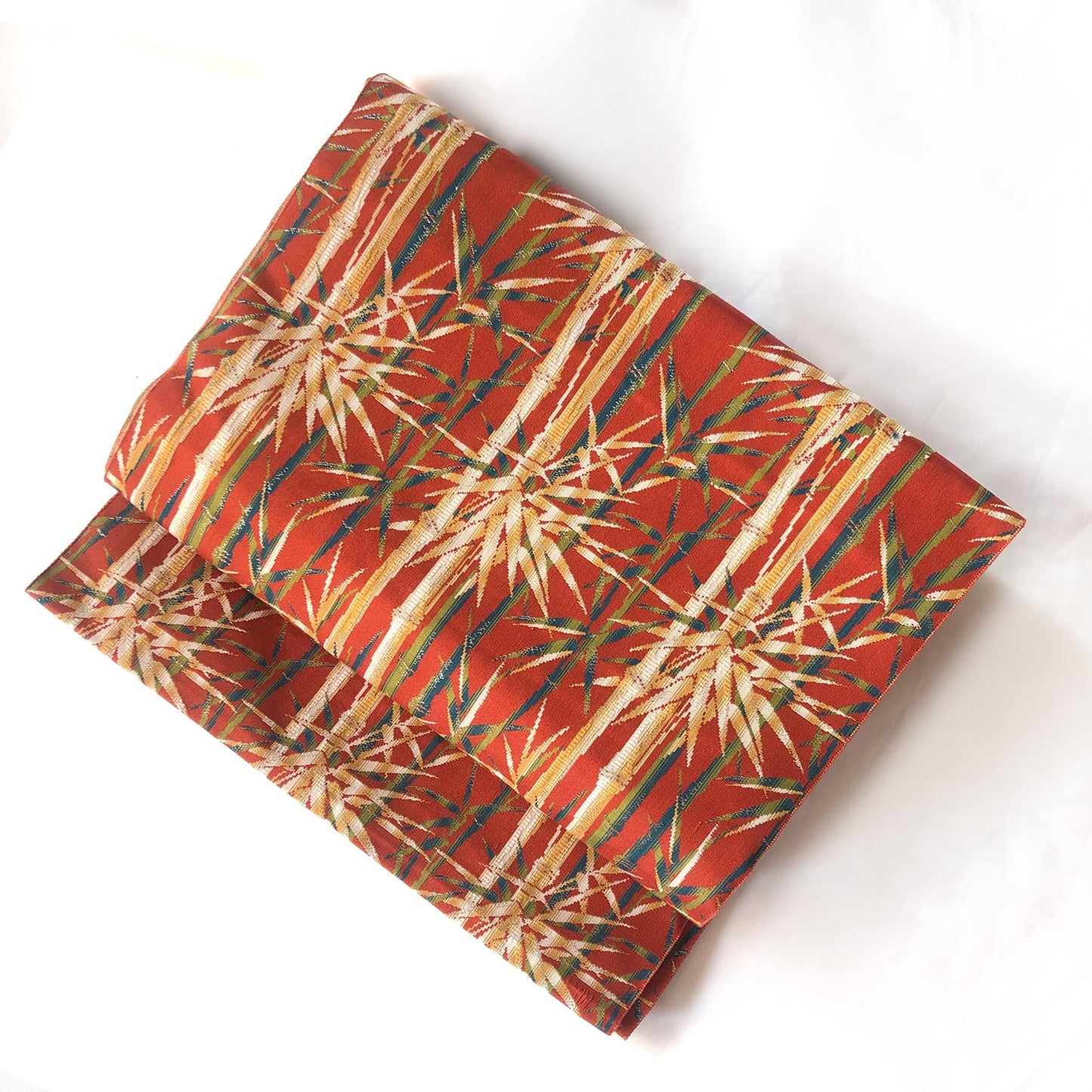Vintage Nagoya obi - bamboo stalks on a red background