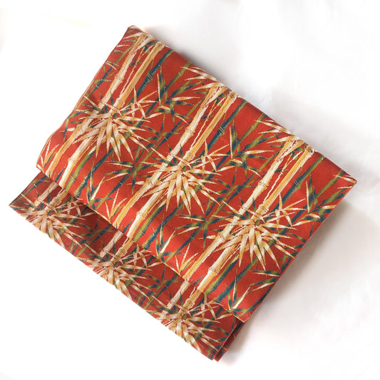 Vintage Nagoya obi - bamboo stalks on a red background