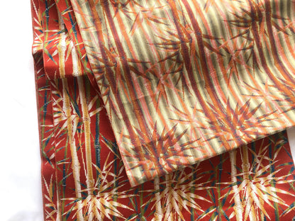Vintage Nagoya obi - bamboo stalks on a red background