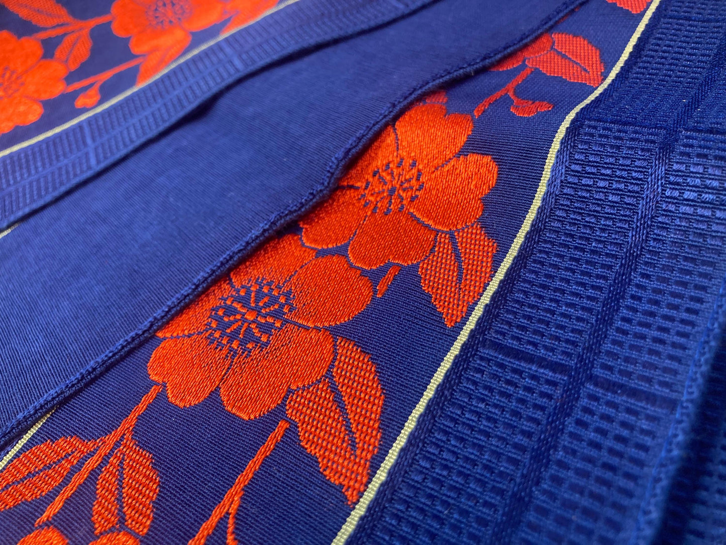 Reversible Japanese hanhaba obi - saturated blue with bright red flower stripe