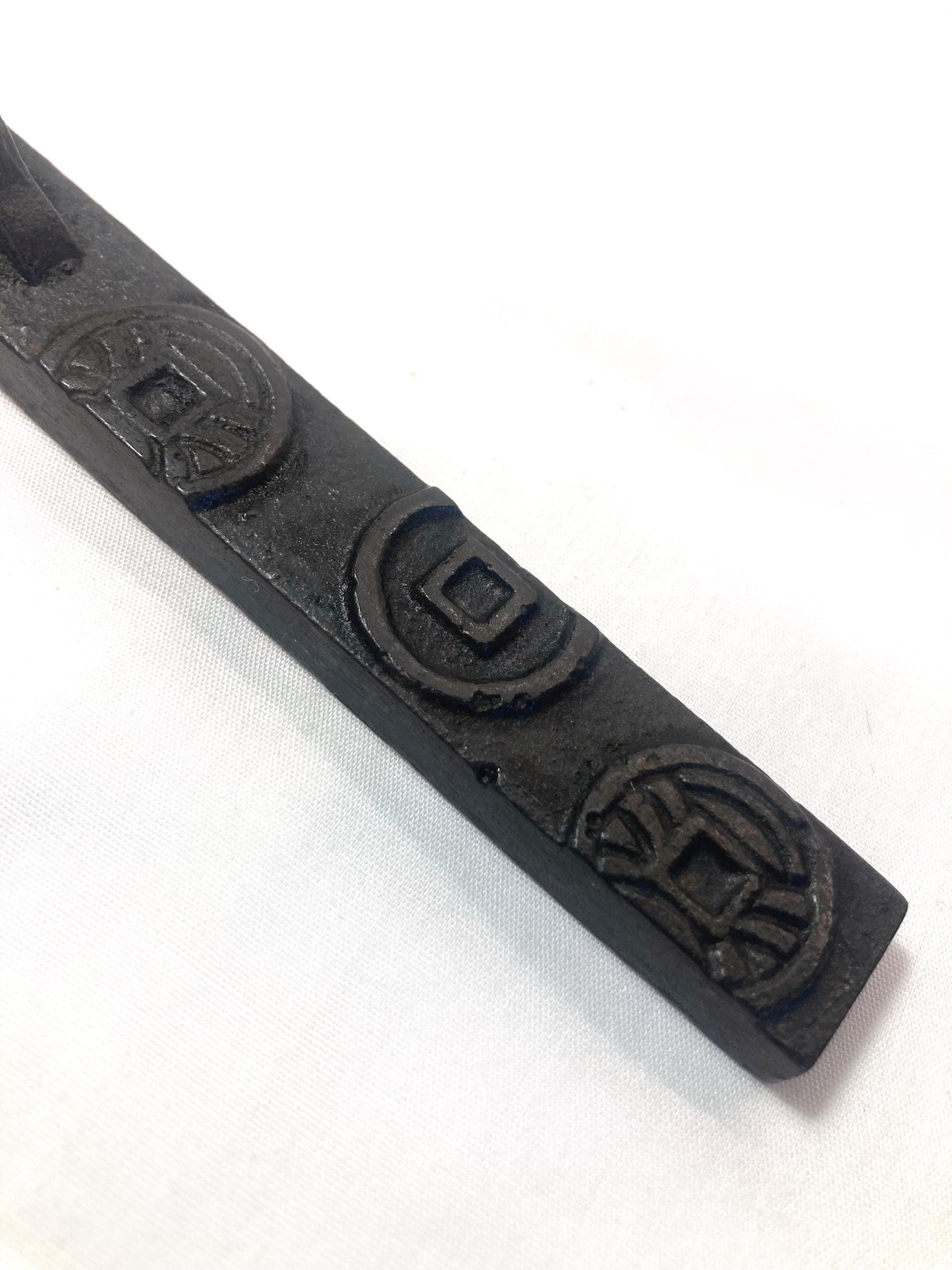 Japanese iron cast paperweight - old coins bar
