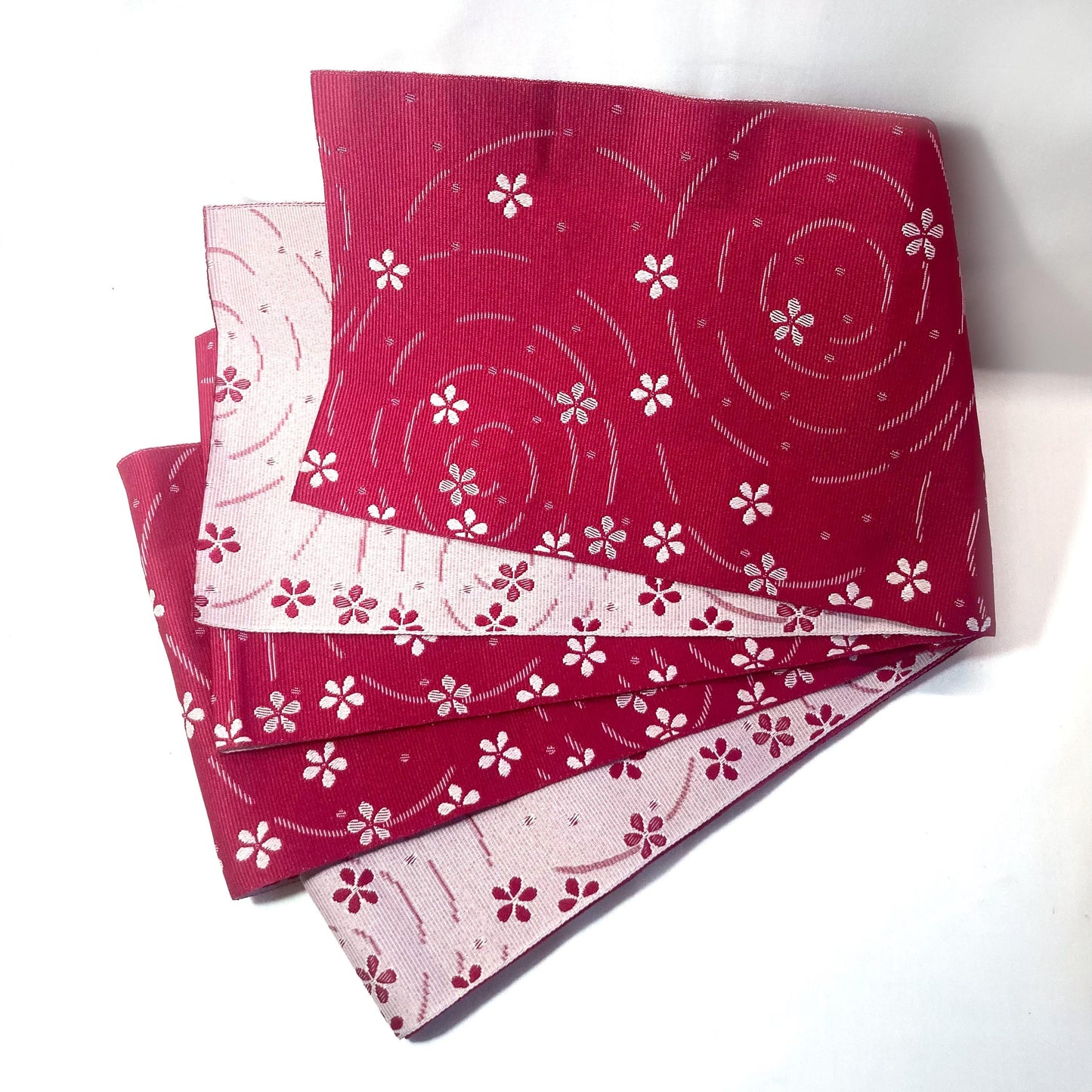 Simple Japanese hanhaba obi - two shades of pink with flowers over water