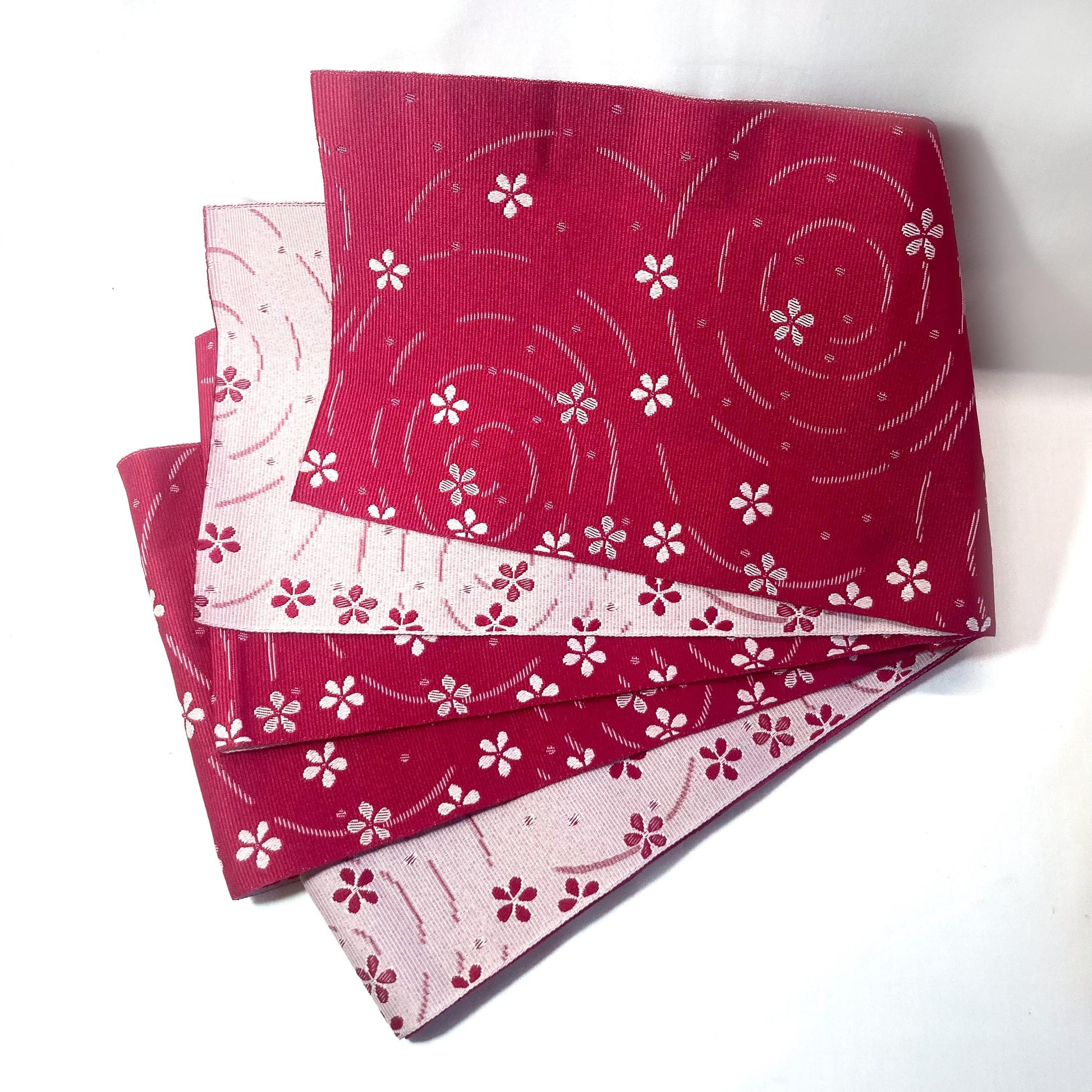 Simple Japanese hanhaba obi - two shades of pink with flowers over water
