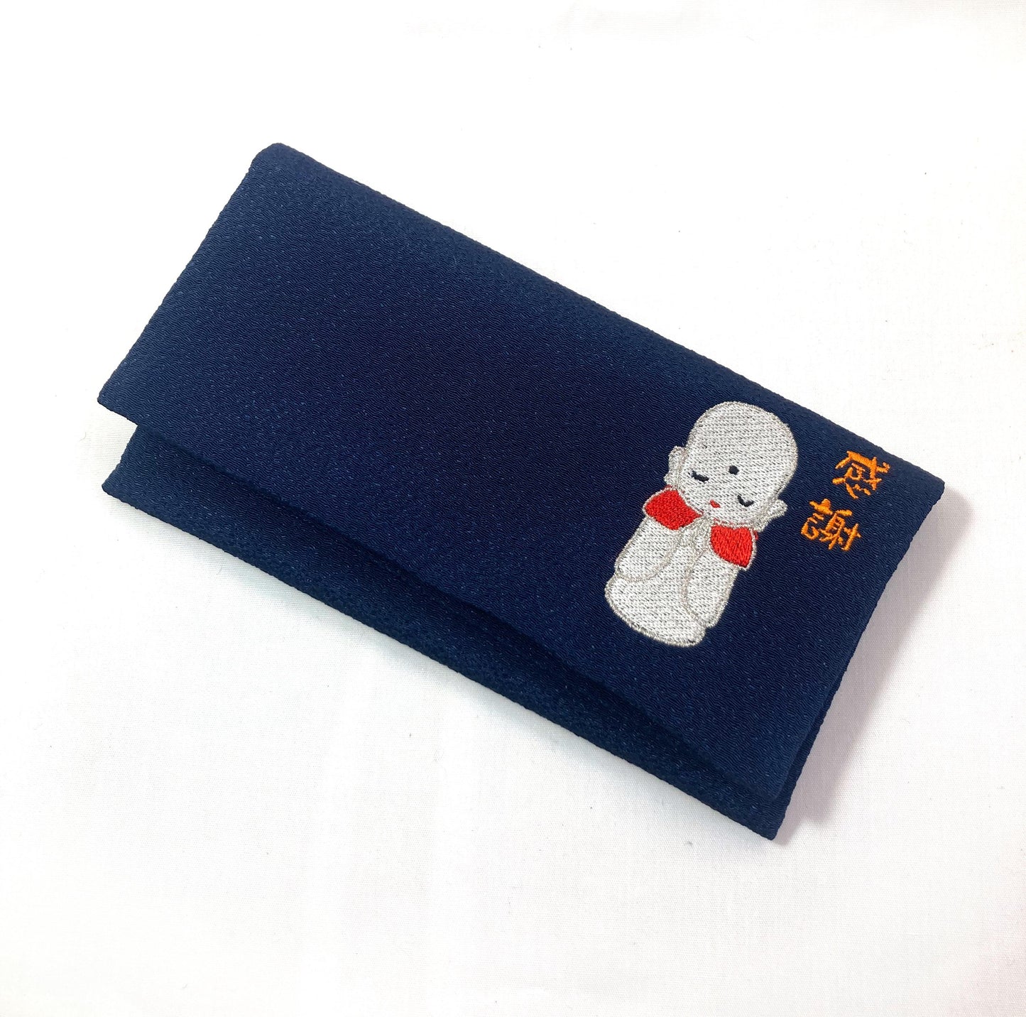 Small Japanese soft pouch / rosary bead cover - dark blue with an image of Jizo Bosatsu