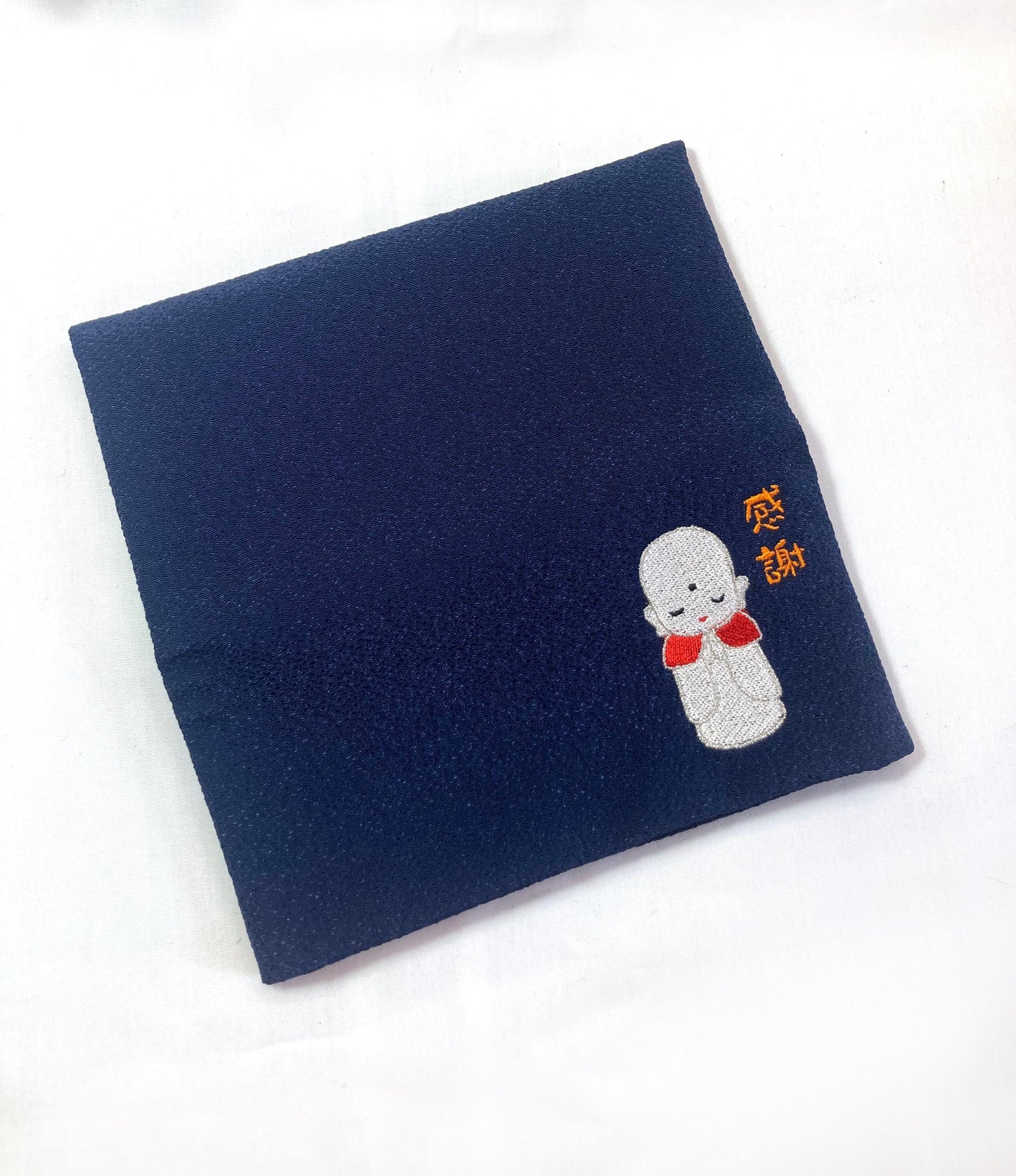 Small Japanese soft pouch / rosary bead cover - dark blue with an image of Jizo Bosatsu