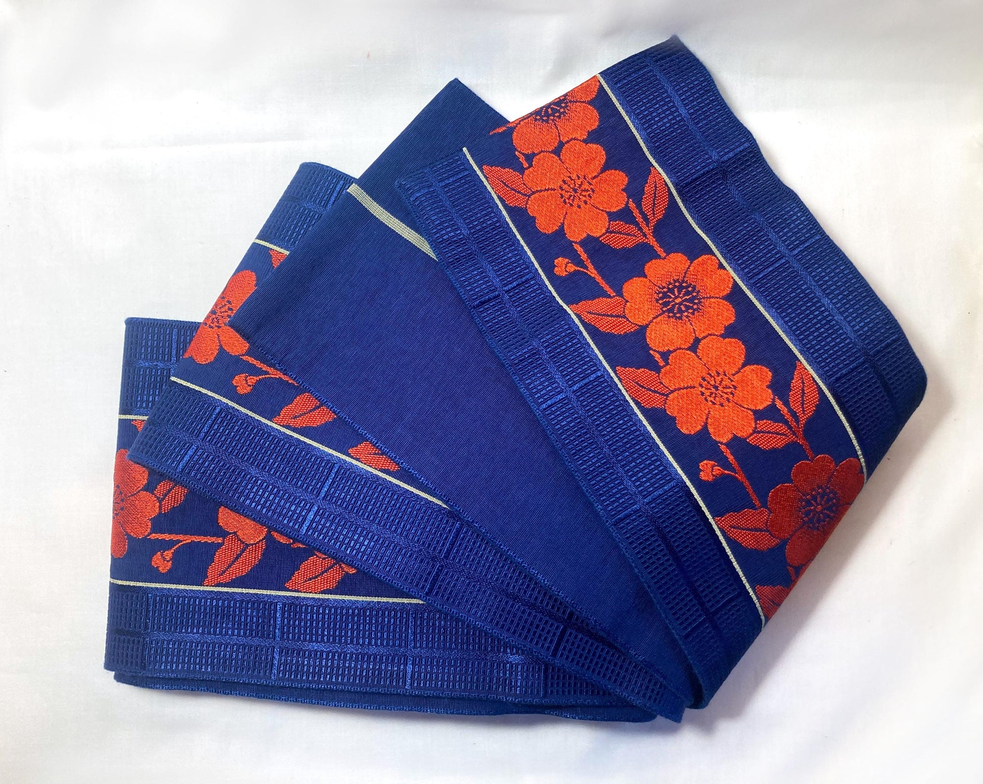Reversible Japanese hanhaba obi - saturated blue with bright red flower stripe