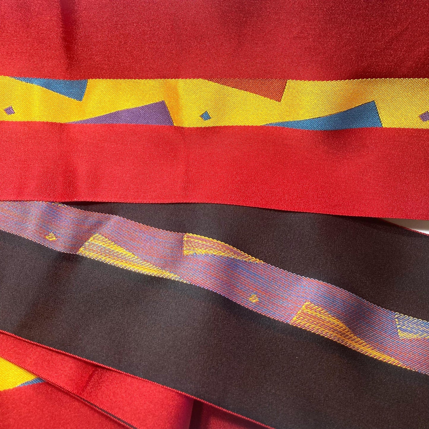 Reversible Japanese hanhaba obi - red and black with a geometric pattern
