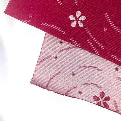 Simple Japanese hanhaba obi - two shades of pink with flowers over water