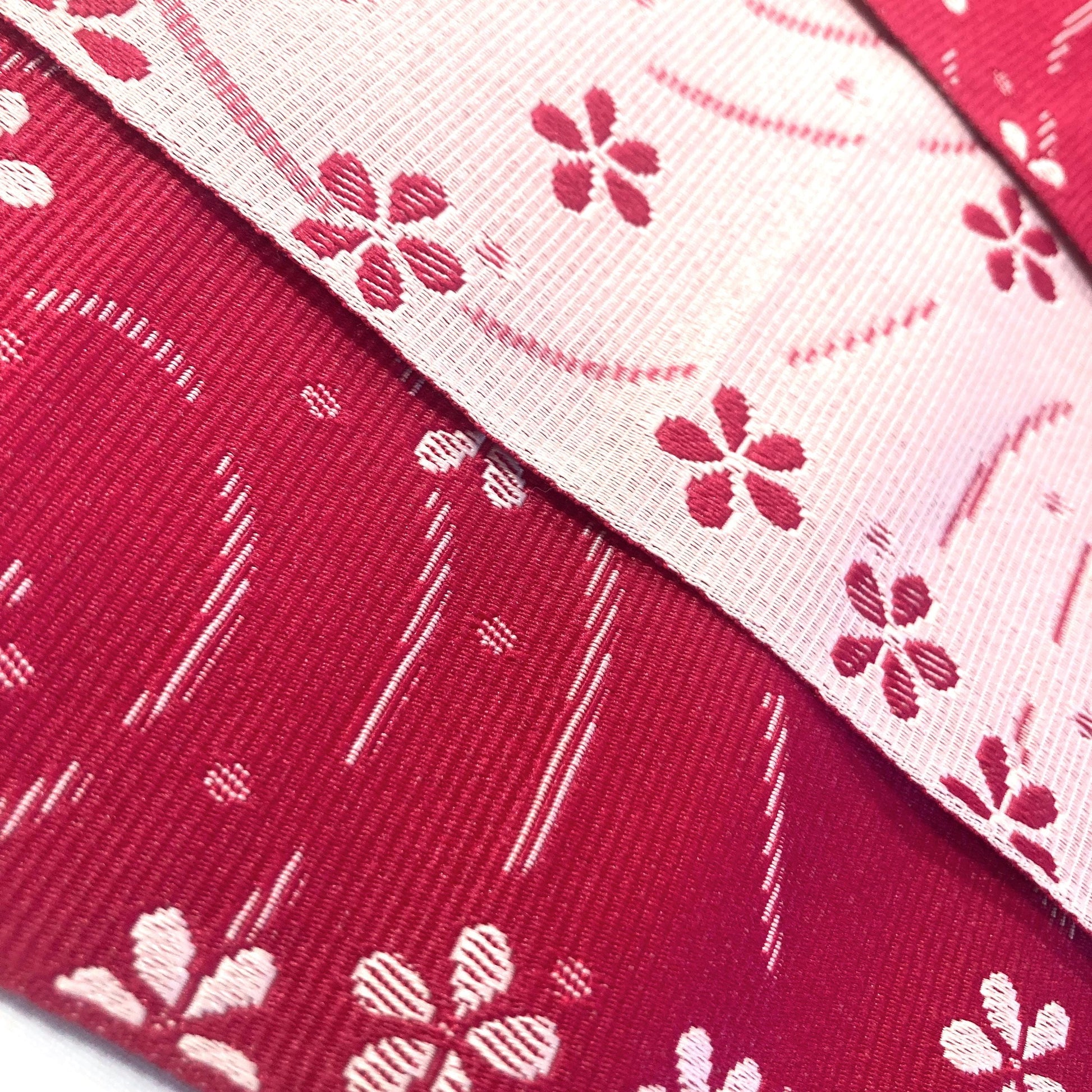 Simple Japanese hanhaba obi - two shades of pink with flowers over water