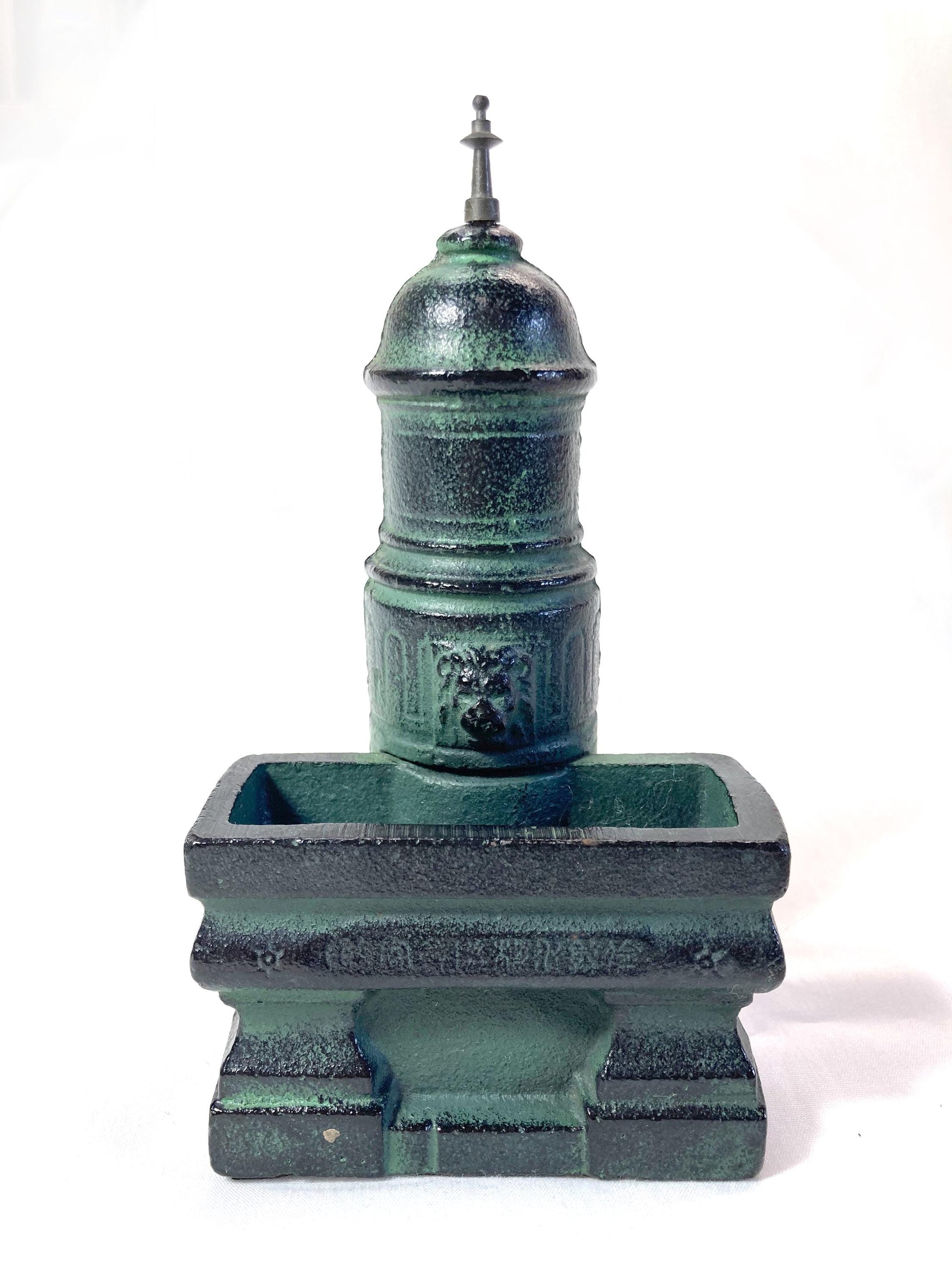 Japanese iron cast paperweight - water fountain